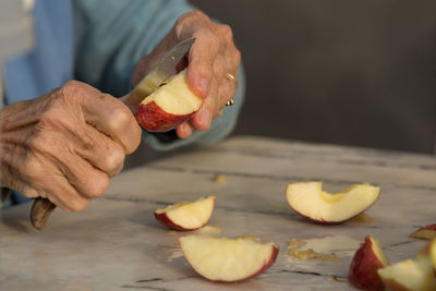 Close-up of person preparing food