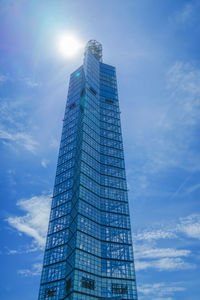 Low angle view of skyscraper against sky