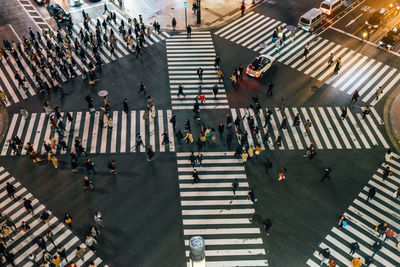 High angle view of people walking on street