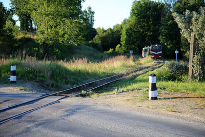 Train on railroad track against sky