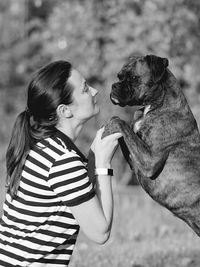 Rear view of woman with dog