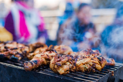 Close-up of meat on barbecue grill