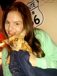 Portrait of woman with dog