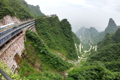 High angle view of trees and mountains against sky