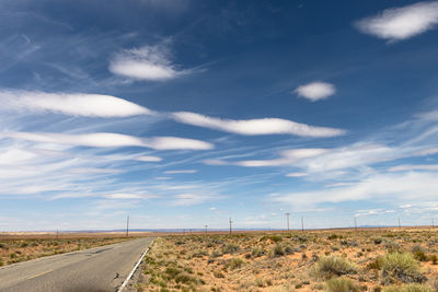 Empty road against sky