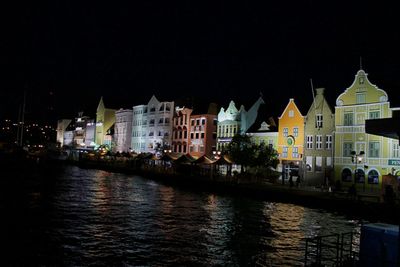 River passing through city at night