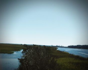 Scenic view of lake against clear sky