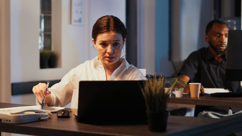 Businesswoman working at desk in office