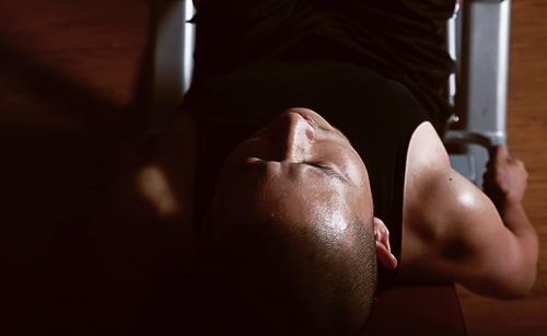 Low section of woman sitting on floor
