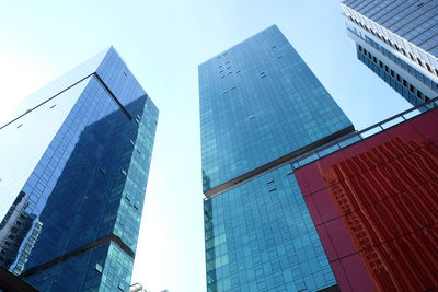 Low angle view of modern buildings against clear sky