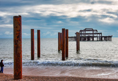 Brighton west pier. after it was burned down. now unconnected to the shore. posts in the foreground