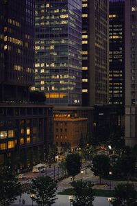 Illuminated buildings in city at night