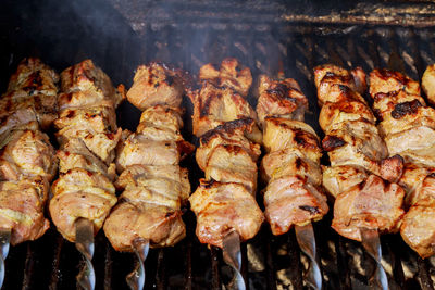 Close-up of meat on barbecue grill