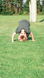 Boy playing on field