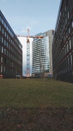 View of buildings in city against sky