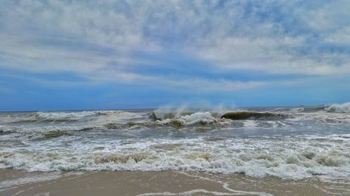 Waves splashing on beach