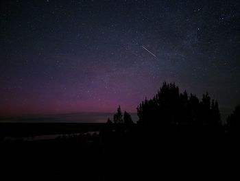 Scenic view of sea against sky at night