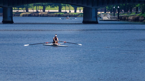 Man sitting in river