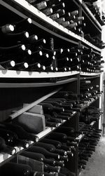 Row of wine bottles on rack