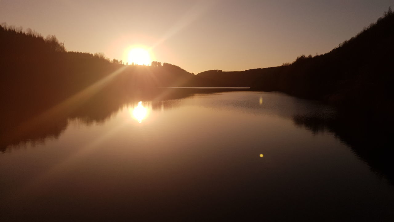 LAKE AGAINST SKY DURING SUNSET