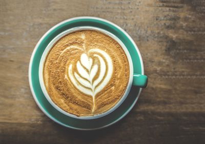 Directly above shot of cappuccino on table