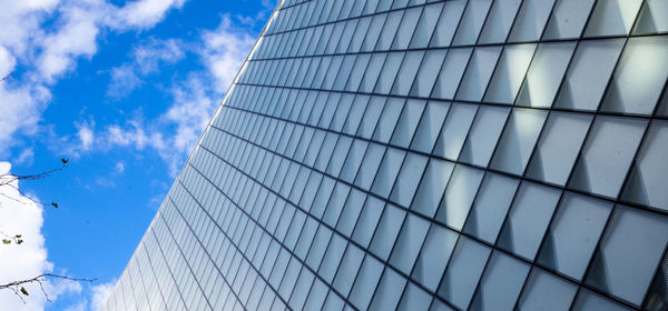 Low angle view of modern building against sky