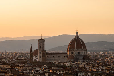 High angle view of townscape against sky during sunset