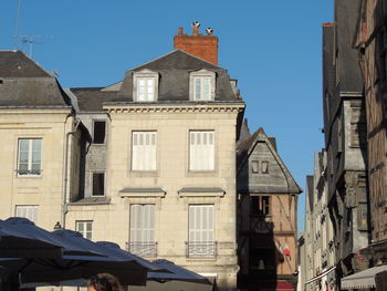 Low angle view of residential buildings against sky