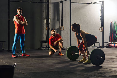 Young man with arms outstretched