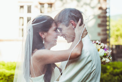 Young couple kissing outdoors