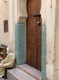 Open door of old building in fez