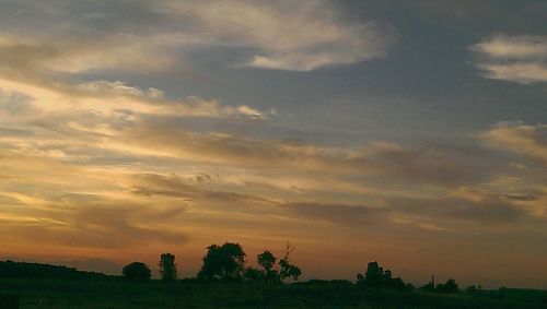 Scenic view of landscape at sunset