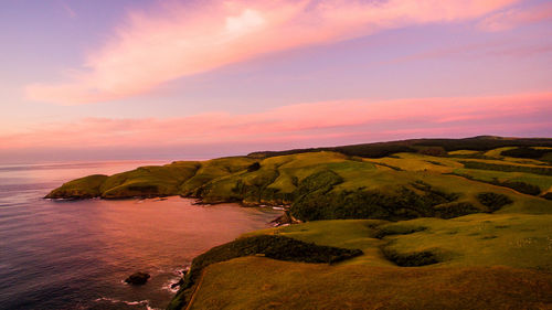 Scenic view of sea against sky during sunset