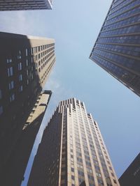 Low angle view of skyscrapers against sky