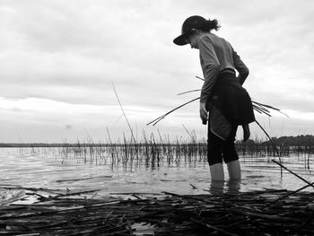 Woman standing in water