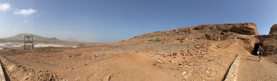 Panoramic view of desert against sky