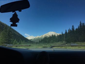 Road seen through car windshield