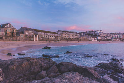 Scenic view of sea against sky at sunset