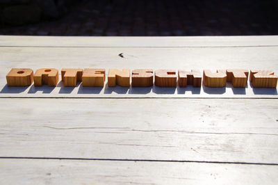 High angle view of wooden alphabets on table