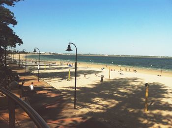 Scenic view of beach against clear sky