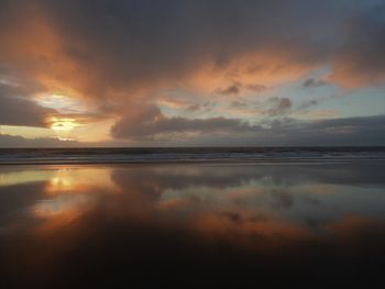 Scenic view of sea against sky during sunset