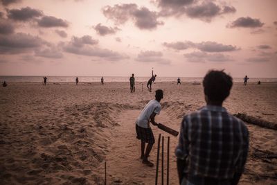 Silhouette of people on beach