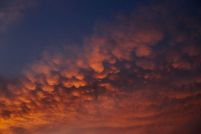 Low angle view of dramatic sky at sunset