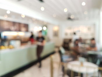 Defocused image of people in restaurant