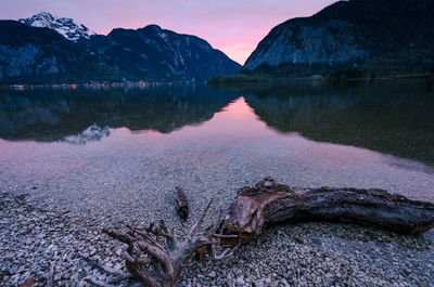 Scenic view of lake against sky during sunset