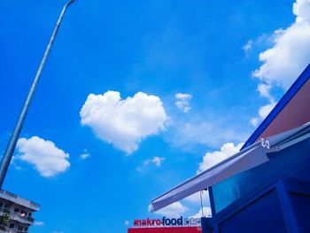 Low angle view of building against blue sky