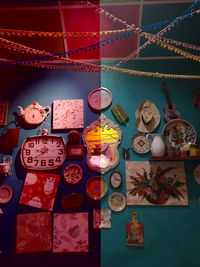 Close-up of illuminated lanterns hanging on table