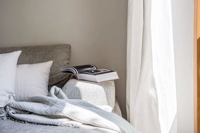 Close-up of blanket on bed at home