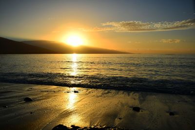 Scenic view of sea against sky during sunset