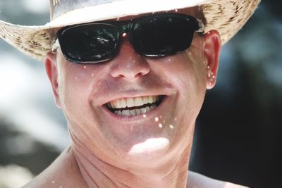 Portrait of smiling man wearing sunglasses